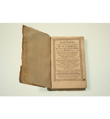 Escudo Triumphante de el Carmelo su Sto. Escapulario, con que María Sma. defiende a los que devotamente le visten de todos los peligros en la vida y en la otra del fuego del Purgatorio.